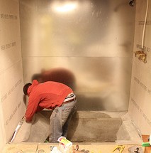 Bathroom Update- Metal Panels and Colored Concrete Walls